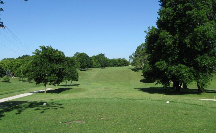 Course greens with cart path on left